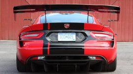 What is the purpose of car spoilers?