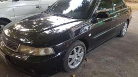 Mitsubishi Lancer automatic 2002 mx for sale 