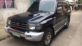 Selling Black Mitsubishi Pajero 1999 at 132000 km 