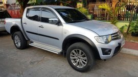 Selling Used Mitsubishi Strada 2014