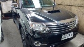 Selling Black Toyota Fortuner 2015 in Quezon City