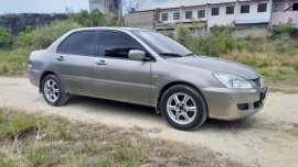 Selling 2004 Mitsubishi Lancer for sale in Consolacion