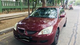 Selling Mitsubishi Lancer 2004 Manual Gasoline in Quezon City