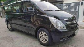 Black Hyundai Grand Starex 2014 at 40000 km for sale