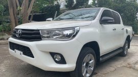 Selling White Toyota Hilux 2016 Manual Diesel in Quezon City