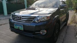 Selling Black Toyota Fortuner 2014 Automatic Diesel in Las Piñas