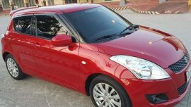Selling Red Suzuki Swift 2014 Manual Gasoline in Trece Martires