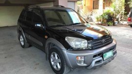 Selling Black Toyota Rav4 2000 in Quezon City