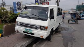Selling White Mitsubishi L300 2012 at 70000 km in Quezon City