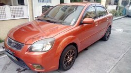 Selling Orange Kia Rio 2011 Automatic Gasoline in Quezon City