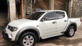 Mitsubishi Strada 2009 Manual Diesel at 90000 km for sale in Baguio