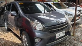 Selling Grey Toyota Wigo 2015 at 20000 km in Quezon City