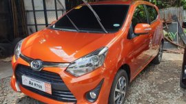 Sell Orange 2019 Toyota Wigo in Quezon City