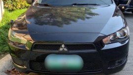 Selling Black Mitsubishi Lancer Ex 2012 Manual Gasoline at 80000 km 