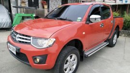 Selling Red Mitsubishi Strada 2014 at 49000 km in Quezon City