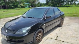 Selling Mitsubishi Lancer 2011 Manual Gasoline in Alaminos