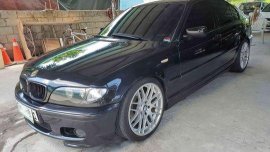 Selling Black Bmw 318I 2003 at 100000 km 