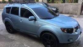 Selling Mitsubishi Outlander 2009 Automatic Gasoline in Binmaley