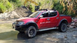 Red Mitsubishi Strada 2012 Automatic Diesel for sale 