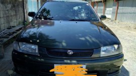 Selling Mazda Familia 1997 Manual Gasoline in Cabanatuan