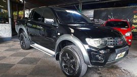 Black Mitsubishi Strada 2011 at 71000 km for sale 