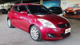Red Suzuki Swift 2011 at 61000 km for sale