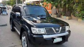 Selling Black Nissan Patrol 2002 in Malolos