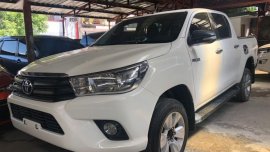 Selling White Toyota Hilux 2016 in Quezon City