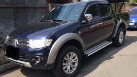 Selling Mitsubishi Strada 2014 Automatic Diesel in Quezon City