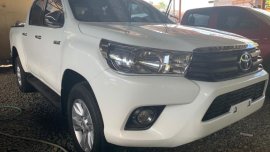 White Toyota Hilux 2016 Manual Diesel for sale in Quezon City