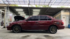 Red Nissan Sentra Exalta 2000 at 93000 km for sale 