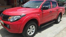 Red Mitsubishi Strada 2015 Manual Diesel for sale 