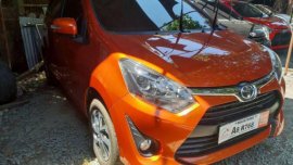 Sell Orange 2019 Toyota Wigo in Quezon City