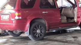 Red Ford Escape 2005 at 124000 km for sale in Cavite 