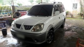 Selling White Mitsubishi Adventure 2005 at 82000 km in Davao City 