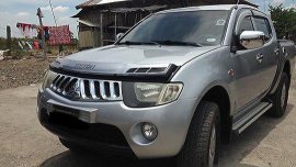 Silver Mitsubishi Strada 2007 at 98000 km for sale