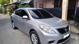 Silver Nissan Almera 2013 Sedan Manual Gasoline for sale 