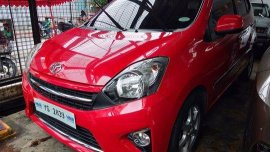 Red Toyota Wigo 2016 for sale in Quezon City