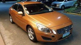 Orange Volvo S60 2011 Automatic Gasoline for sale