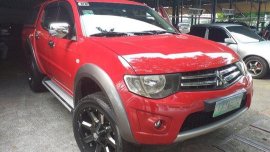 Red Mitsubishi Strada 2011 at 67256 km for sale