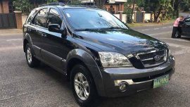 Black Kia Sorento 2004 at 90000 km for sale