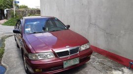Red Nissan Sentra 2000 at 118000 km for sale