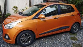 Sell Orange 2015 Hyundai Grand i10 Hatchback at 31000 km 