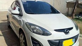 White Mazda 2 2011 at 74000 km for sale