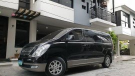 Black Hyundai Grand Starex 2014 at 47000 km for sale