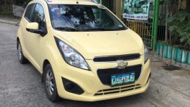 Yellow Chevrolet Spark 2013 Hatchback for sale in Manila 