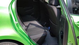 Green Mazda 2 2013 Hatchback Automatic Gasoline for sale