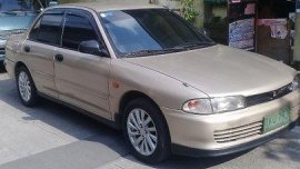 Beige Mitsubishi Lancer 1993 Manual Gasoline for sale