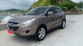 Sell Brown 2011 Hyundai Tucson at 60000 km