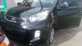 Black Kia Picanto 2016 at 25000 km for sale in Tanza 